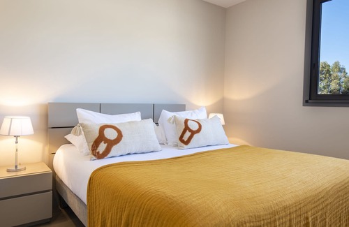Santa Giulia House | Duplex apartment with private patio Santa Giulia