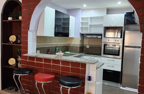 Aousja Apartment | Duplex Bien Equipe Securise Avec Jardin et Veranda