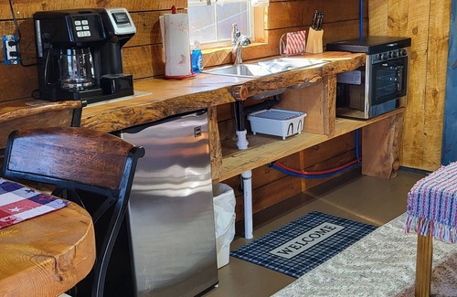 Hot Springs Cabin | Eagle's Nest Cabin/Sibley4 Tent combo @EvansCliff hot tub canyon views