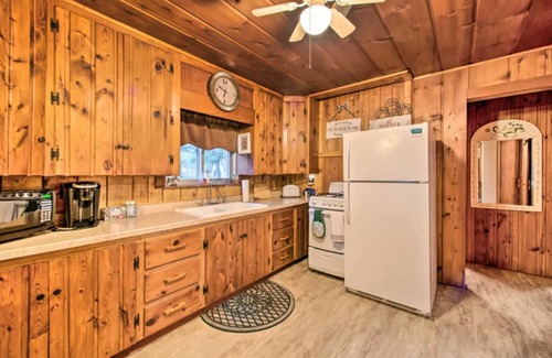 East Tawas House | East Tawas Cabin with Deck, Backyard & Fire Pit!