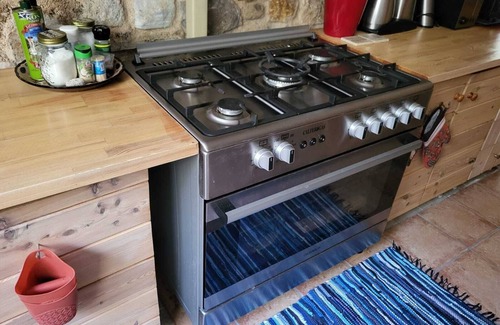 Mastichari House | Eco Secluded hand built stone house in an oasis