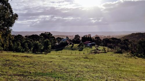Elevated Plains House | El Camino country cottage with terrace and stunning views
