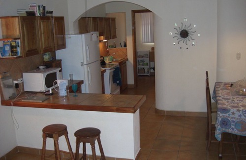 Samara Condo | Elegant Condo, in town & a short walk to the beach. Great location!