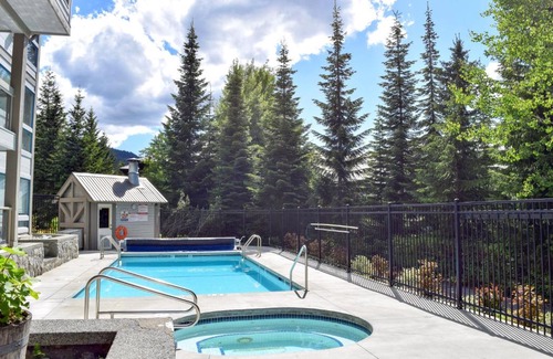 Upper Village House | Elegant Ski In Ski Out Condo by Harmony Whistler