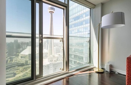 Toronto Entertainment District Apartment | Elegant Waterfront Downtown Toronto / Unobstructed CN Tower View