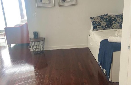 Toronto Entertainment District Apartment | Elegant Waterfront Downtown Toronto / Unobstructed CN Tower View