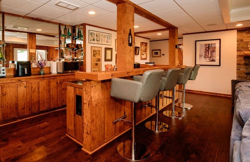 Asheville Apartment | Enjoy a beverage while viewing the Blue Ridge Mountains from the heated pool!