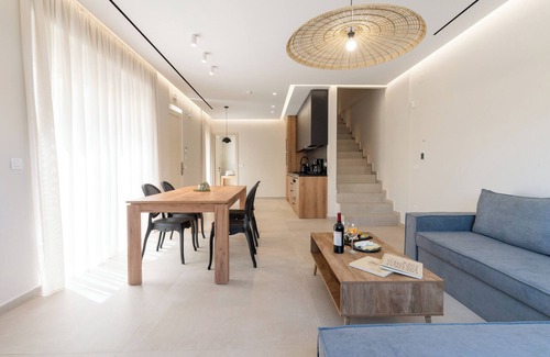 Agios Dimitrios Apartment | Enjoy a comfortable and luxurious stay.