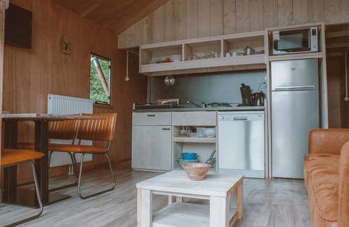 Voorthuizen House | Enjoy a unique stay in the Tiny Safari House at De Boshoek: Comfort in nature for 4 people with luxurious amenities and a great location in the Veluwe.