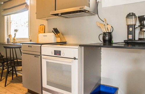 Hundorp House | Enjoy happy hours with your favorite people in this vacation home.