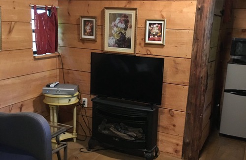 Trumansburg Cabin | Enjoy lake views as you relax on the porch!