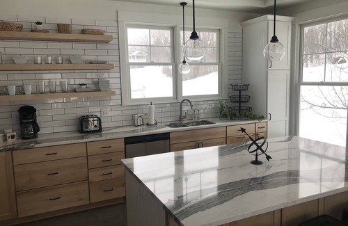 Ludington House | Enjoy spectacular sunsets from high bluff on Lake Michigan!