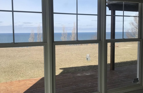 Ludington House | Enjoy spectacular sunsets from high bluff on Lake Michigan!