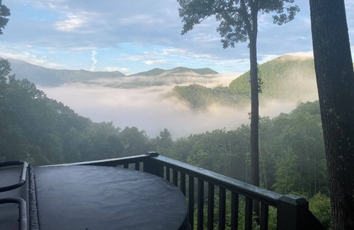 Stecoah House | Enjoy the beautiful view of the mountains in your private hot tub! Pet friendly