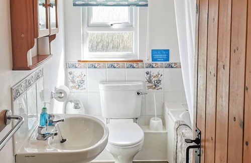 St Mary's Bay Cottage | Enjoy the magnificent views and a holiday in the countryside from this attractive barn conversion cl