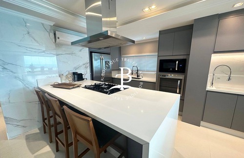 Itapema Apartment | Enjoy the sunset and relax in a heated pool