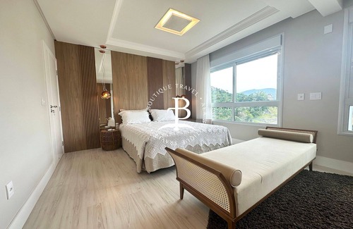 Itapema Apartment | Enjoy the sunset and relax in a heated pool