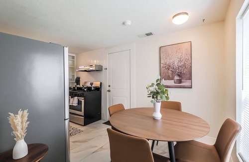 Shady Acres House | Enjoy two separate, fully furnished homes on one property — perfect for large groups. The front home offers 3 bedrooms and 1 bath, while the back two-story home features 3 bedrooms, 2 baths, and an upstairs family room with 2 beds