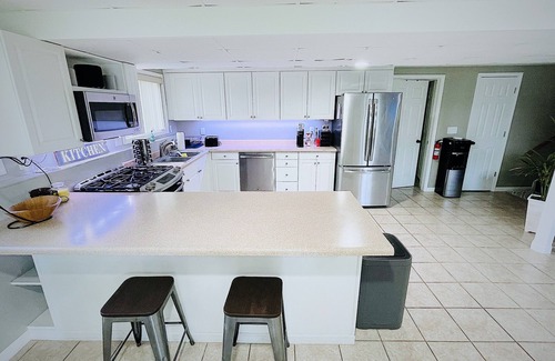 Freeport House | Entire lower level in a private home with walkout fenced yard.