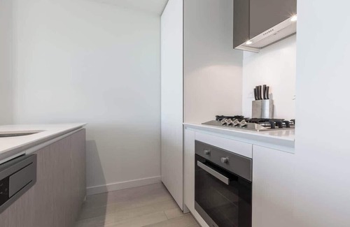 Melbourne Central Business District Apartment | EQ Tower Apartment with View of City Skyline