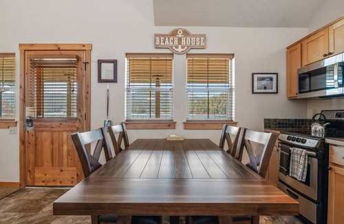 Dover Bay House | Escape the everyday at this peaceful retreat near the water. Perfect for families seeking relaxation, outdoor fun, and lakeside charm.