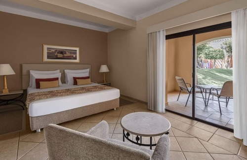 Makadi Bay Hotel | Escape to 3 Comfortable Rooms Near Makadi Water World Aqua Park | Free Parking