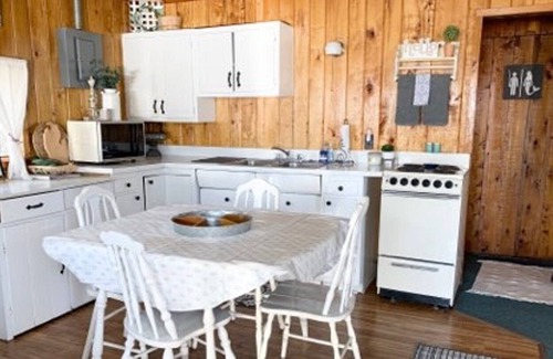 Bellaire Cottage | ESCAPE TO DARLING LAKEFRONT COTTAGE #2 PHILLIPS POINT BELLAIRE, MI