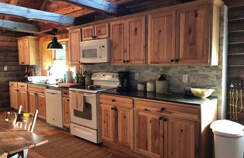 East Worcester Cabin | Escape to the country at our creek-side log cabin.