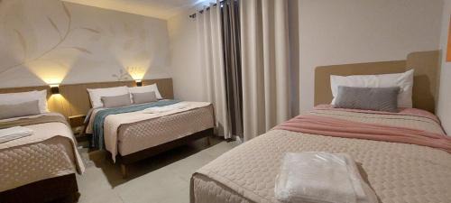 Reboucas Apartment | Espaço Harmonia - COM VAGA GRATUITA um apartamento inteiro e aconchegante para vc!