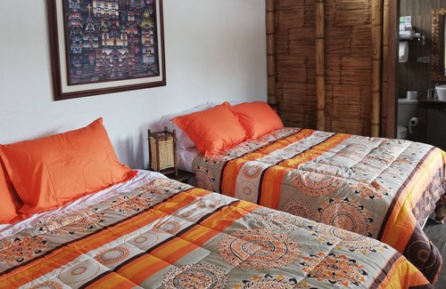 Comuna Dos Mangas Hotel | Estancia Jardín Cabañas