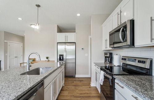 Waukee House | Exclusive Scenic Escape End Unit New Construction Jordan Creek w/2 Car Garage