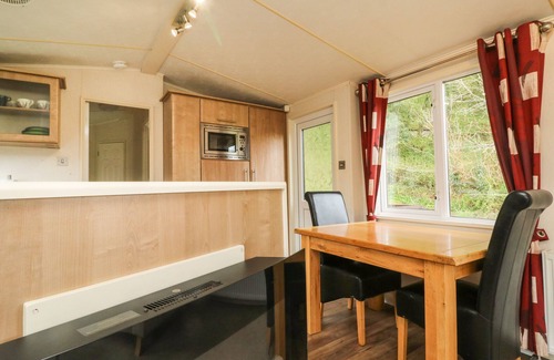 Brushford Cottage | EXE VALLEY LODGE, pet friendly, with hot tub in Bampton, Devon