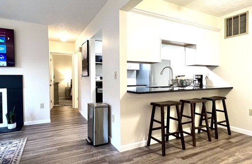 Vandalia Condo | Executive Condo: King primary en-suite! A part of the Uptown Collective Suites