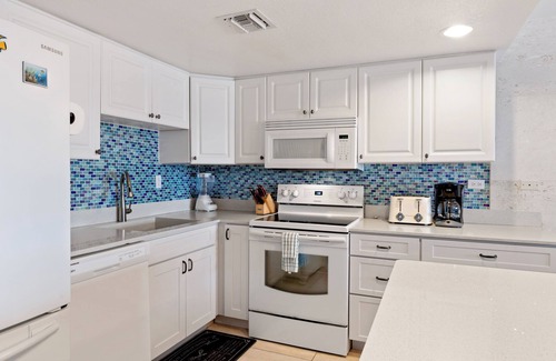 Seven Mile Beach Condo | Experience the turquoise blue waters up close & personal from this unit!