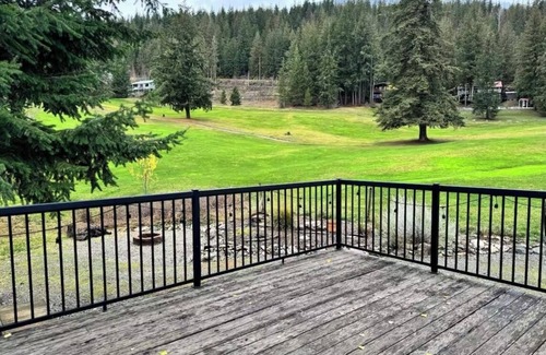 Anglemont House | Experience the warmth of our gorgeous log home backing onto the first fairway.