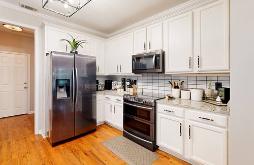 East Point House | Exquisite home with charming deck, washer/dryer, & central AC