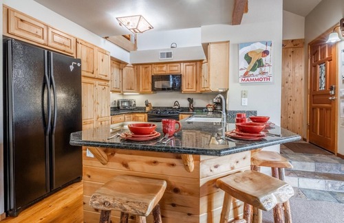 Mammoth Lakes Condo | Fall Getaways Available! Corner Condo with Shared Hot Tub, Near the Free Shuttle Stop to Town!