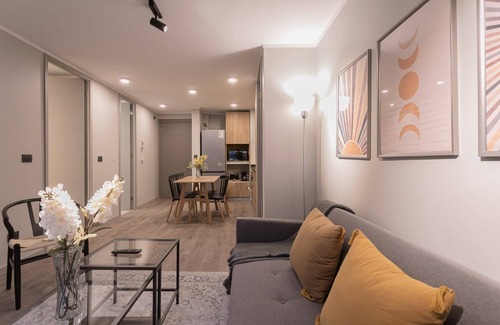 Nunoa Apartment | Family Adventure Charming 2BR in Providencia for 4