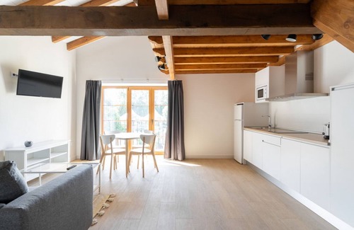 Villaverde de Pontones Apartment | Family apartment with garden view and chill-out cube in the garden