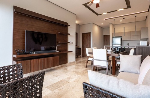 Playa Paraiso Condo | Family-friendly coastal condo with rooftop pool, fire pits & market