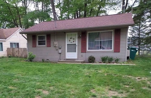 Prudenville House | Family Friendly Lake View Home. Only steps away from Houghton Lake.