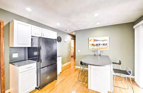 Narragansett Apartment | Family friendly yard, with deck and gas BBQ. The perfect place to relax and enjoy Narragansett!