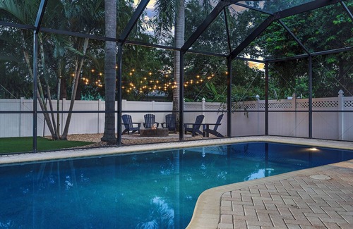 Seminole House | Family Retreat w/Heated Pool, 20+ Games, Firepit, Game room, Near Beach