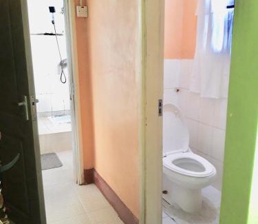 Moshi House | FARAJA HOMESTAY- Seamless Comfort in the Heart of the City - Free WiFi, Warm Hospitality, and Local Delights Await