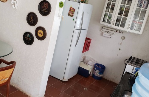 Suzano House | Farm with pool, barbecue and lots of green.