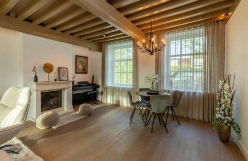 Heinkenszand House | Farmhouse in Zeeland with Windmill Views