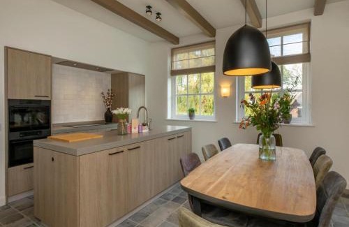 Heinkenszand House | Farmhouse in Zeeland with Windmill Views