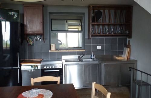 Magliano in Toscana Apartment | Farmhouse in the countryside with magnificent sea view, ideal for families with 4 paws