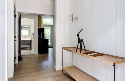 Loudonville Cabin | Fauna Bluff, A cliffside 2-bedroom modern cottage overlooking a bubbling stream.