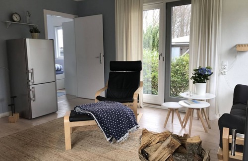 Langballigholz House | Favorite place by the sea - the Blaue Pause vacation home with fireplace and garden.